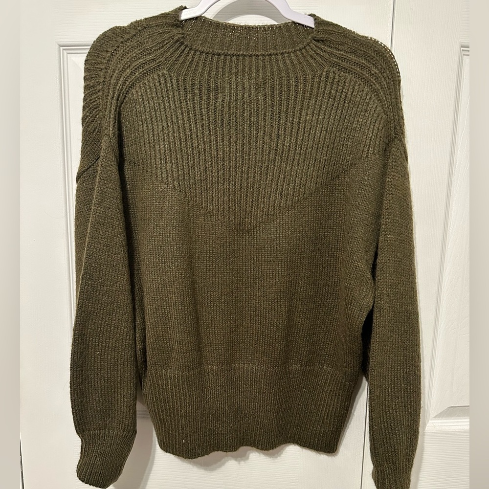 green sweater